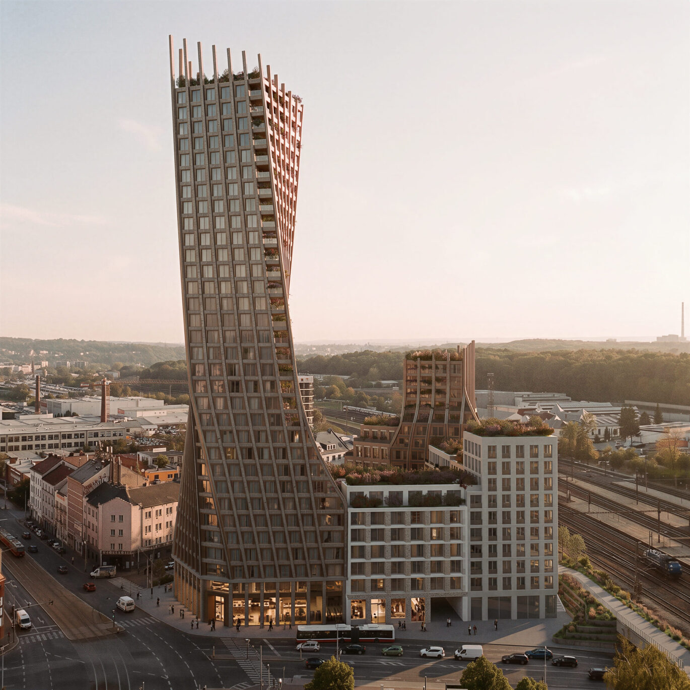 Kroucená věž Harfa Towers se zelenými terasami nad železniční tratí ve Vysočanech